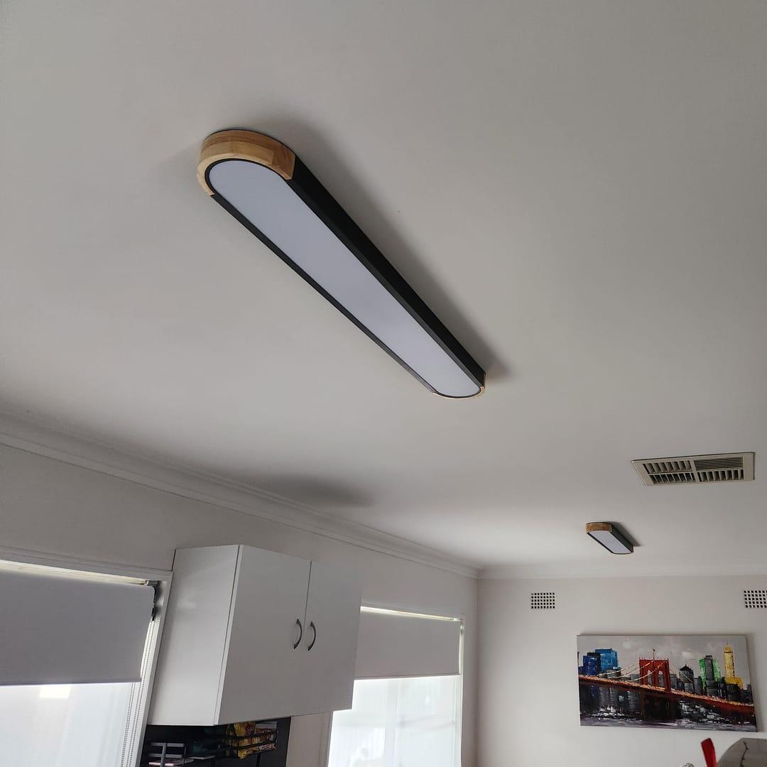 Linear Oval Flush Mount Light in Japandi Wood and Metal Design