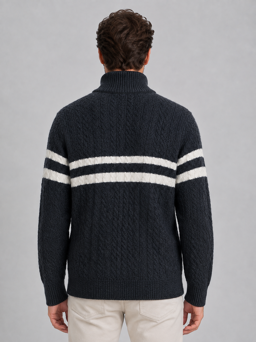 Men's dark charcoal wool cable knit jumper with cream horizontal stripes across chest, viewed from back