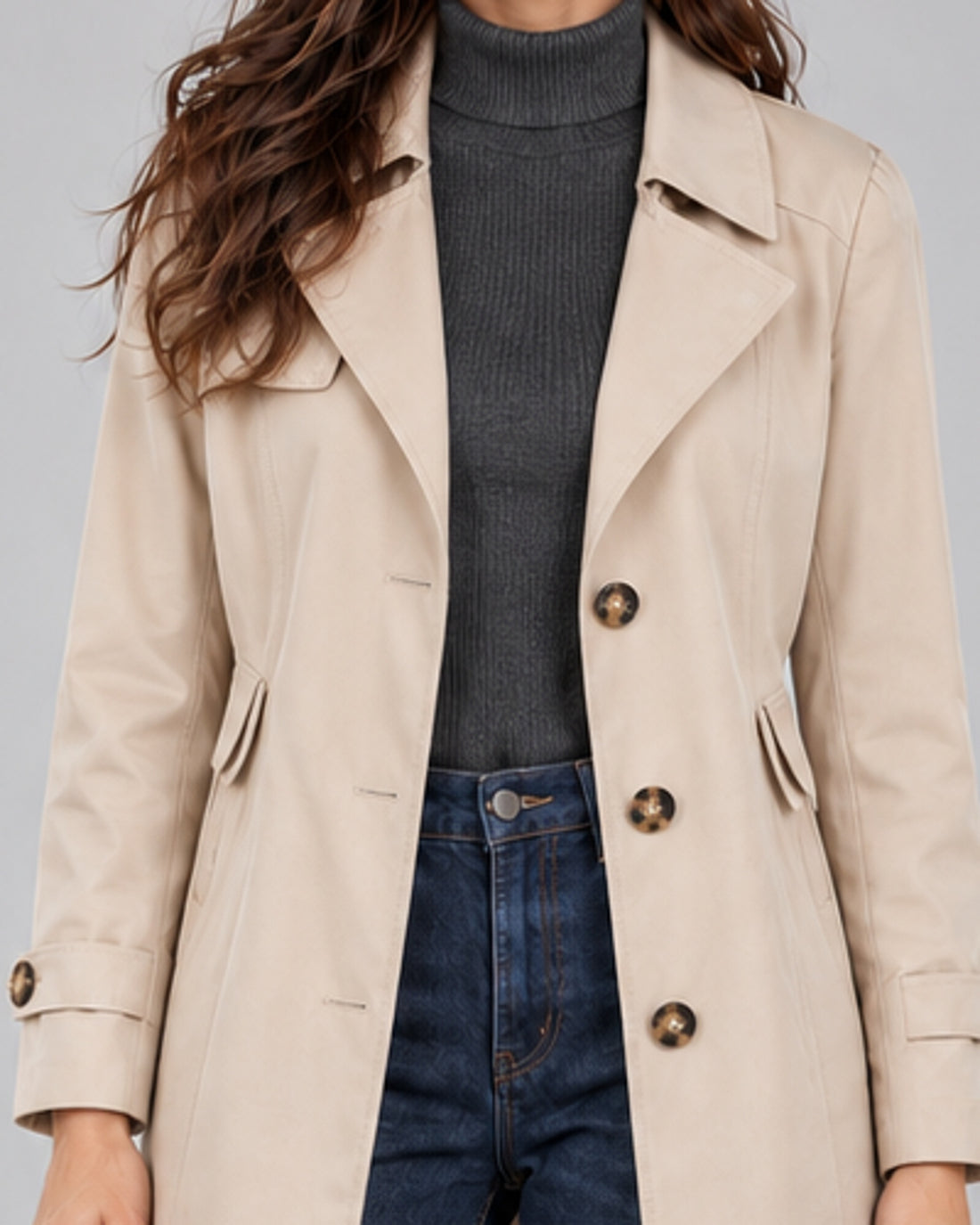 Women's Classic Button Up Trench Coat with Lapel Collar — beige lapel, button and pocket detail cropped from Andrea photograph