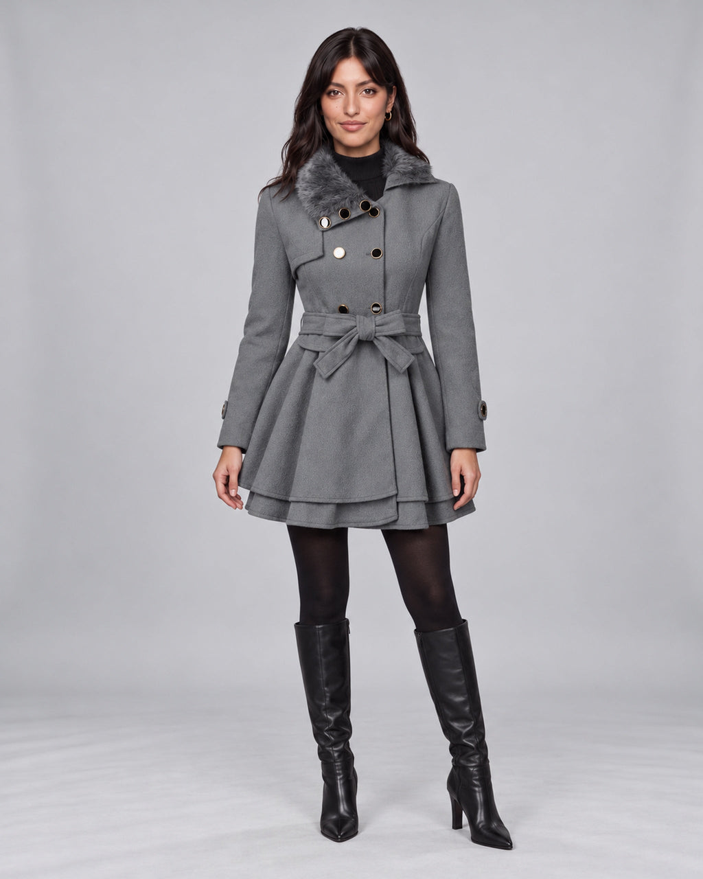 Jasmine wearing claudia grey trench coat on the Urban Devyne saved studio backdrop