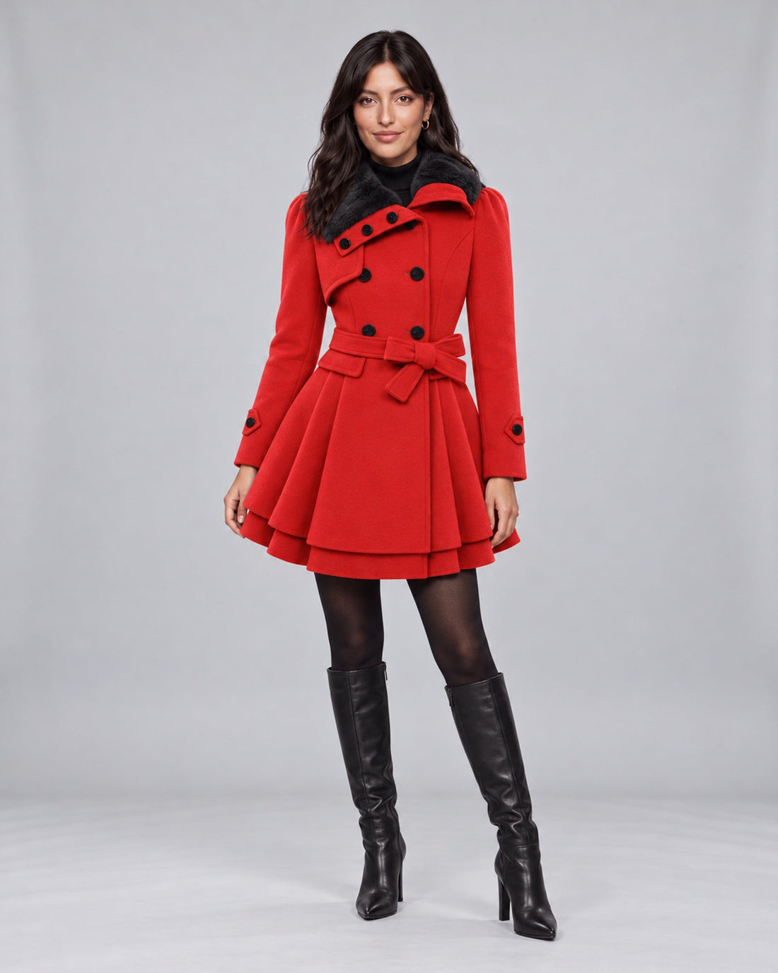 Jasmine wearing claudia red trench coat on the Urban Devyne saved studio backdrop