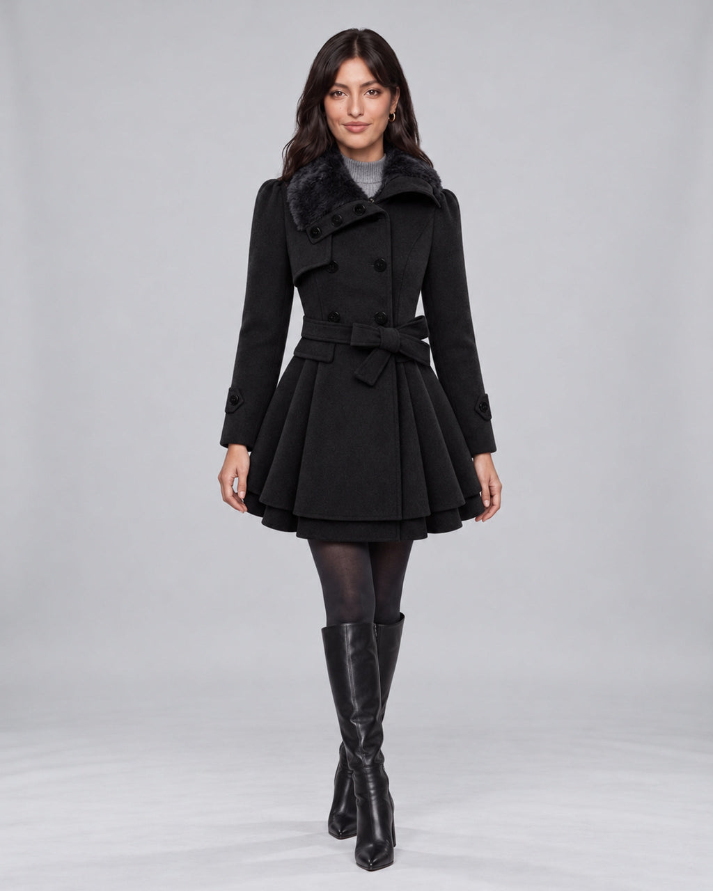 Jasmine wearing claudia black trench coat on the Urban Devyne saved studio backdrop