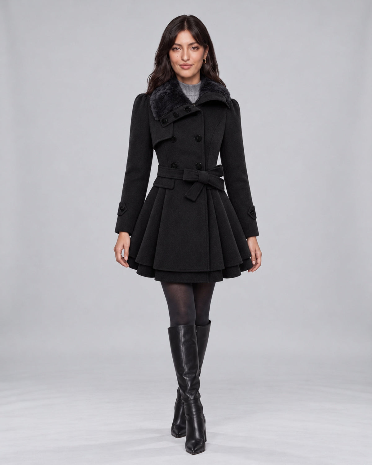 Jasmine wearing claudia black trench coat on the Urban Devyne saved studio backdrop