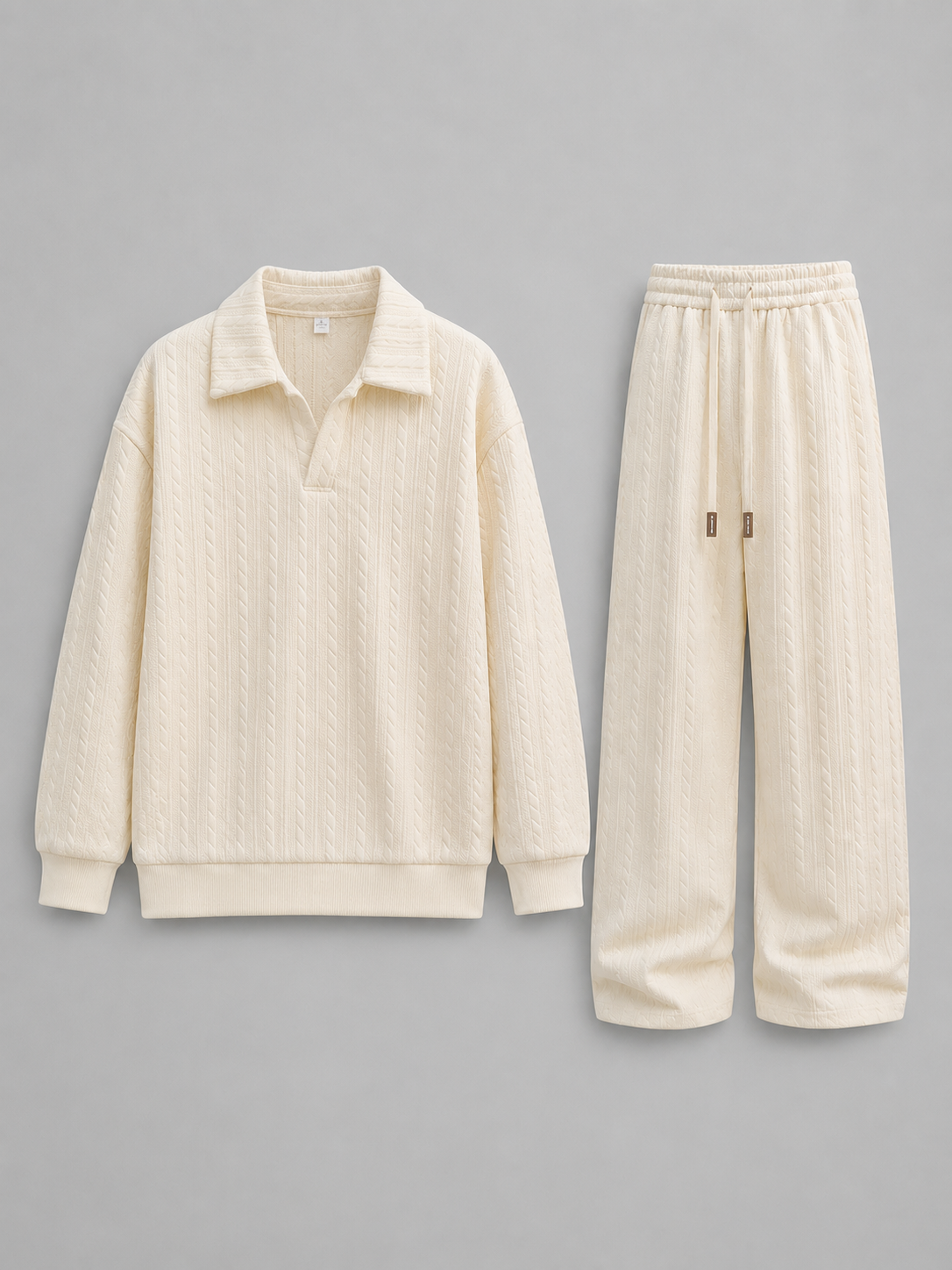 Cream cable knit collared sweatshirt and wide-leg trousers two-piece set displayed on gray background