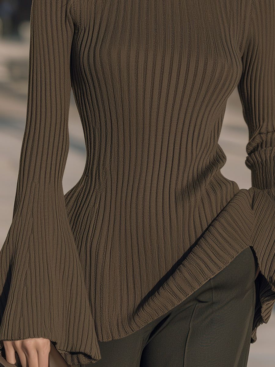 Women's bell-sleeve ribbed mock-neck sweater in taupe with high-low split hem, shown on model from torso down