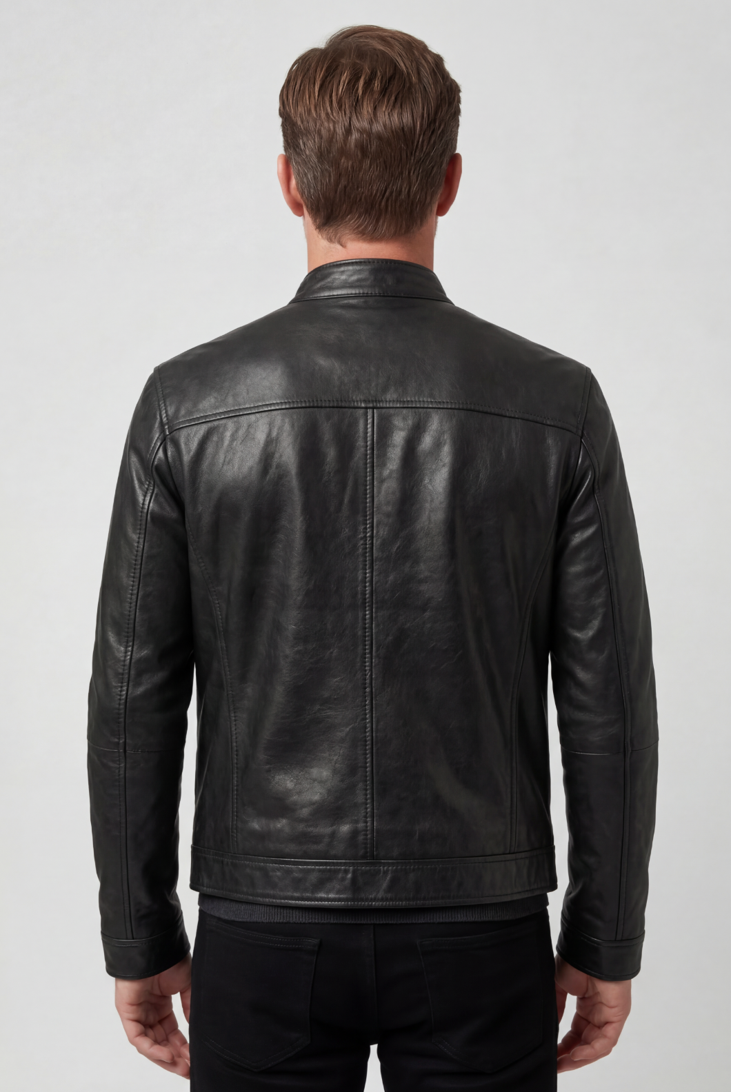 Men's black leather-look jacket with collar, back view showing center seam and ribbed cuffs