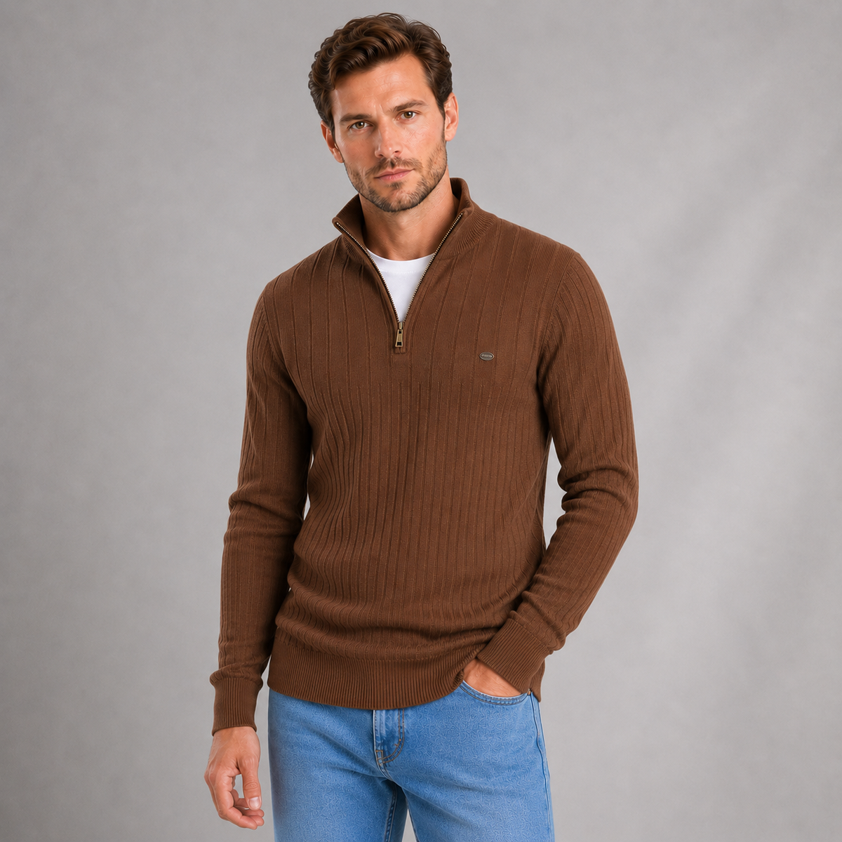 Brown ribbed quarter zip funnel neck jumper worn with white undershirt and blue jeans on male model