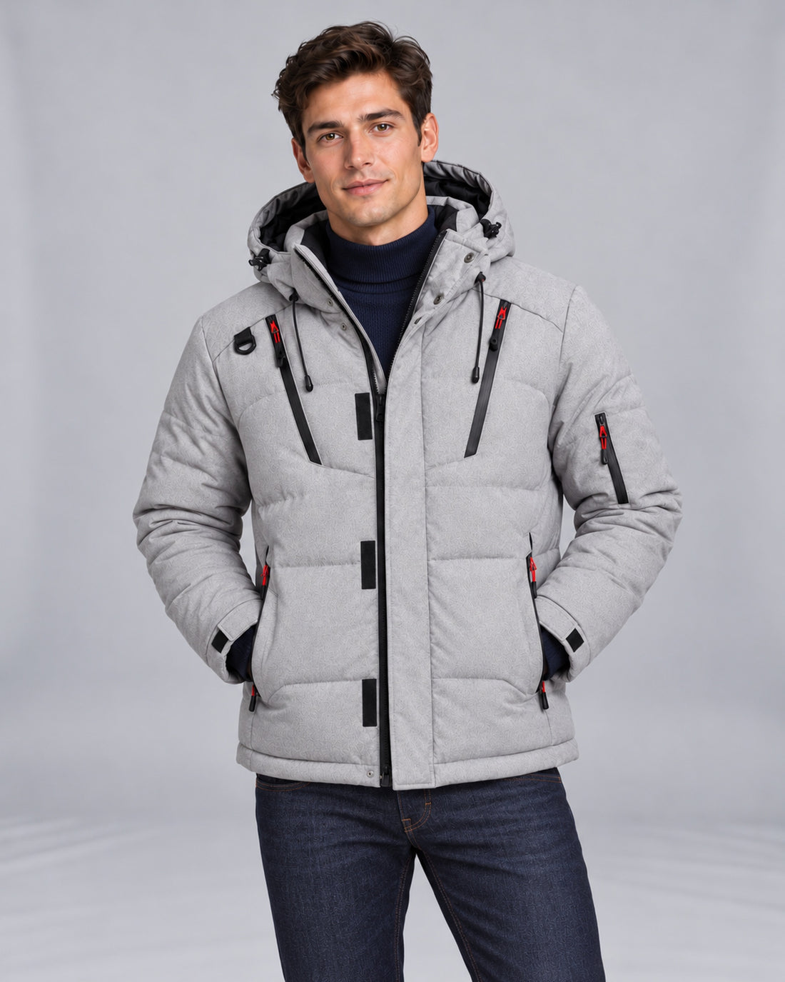 Mountain East Hooded Down Puffer Jacket in Gray — front view, styled with a high-neck knit and denim jeans on Male Model B