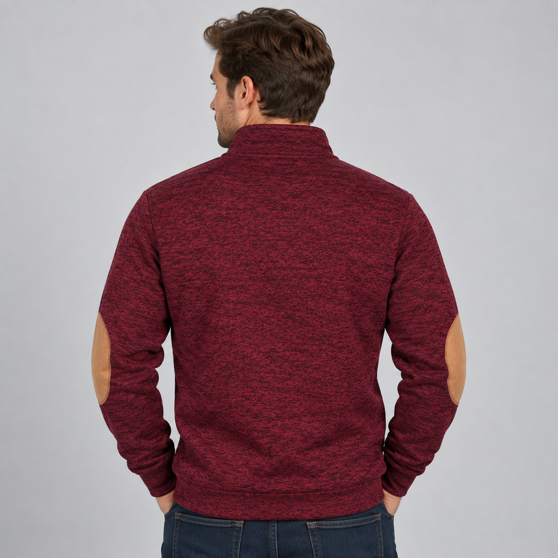 Men's burgundy quarter button stand collar jumper with tan suede elbow patches, shown from behind on gray background