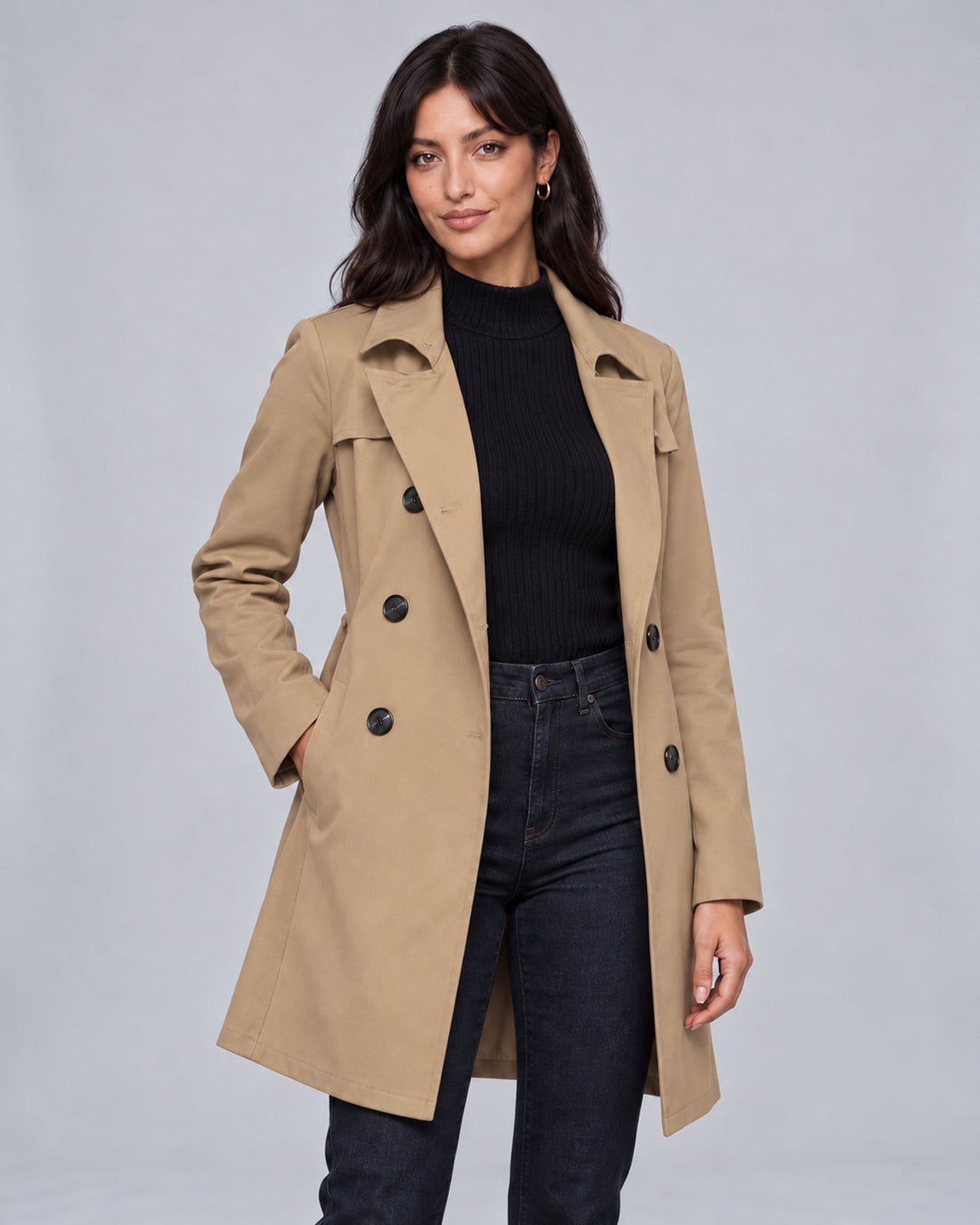 Jasmine wearing Caramel double-breasted trench coat with corrected three-button-per-side layout, front view, Urban Devyne studio