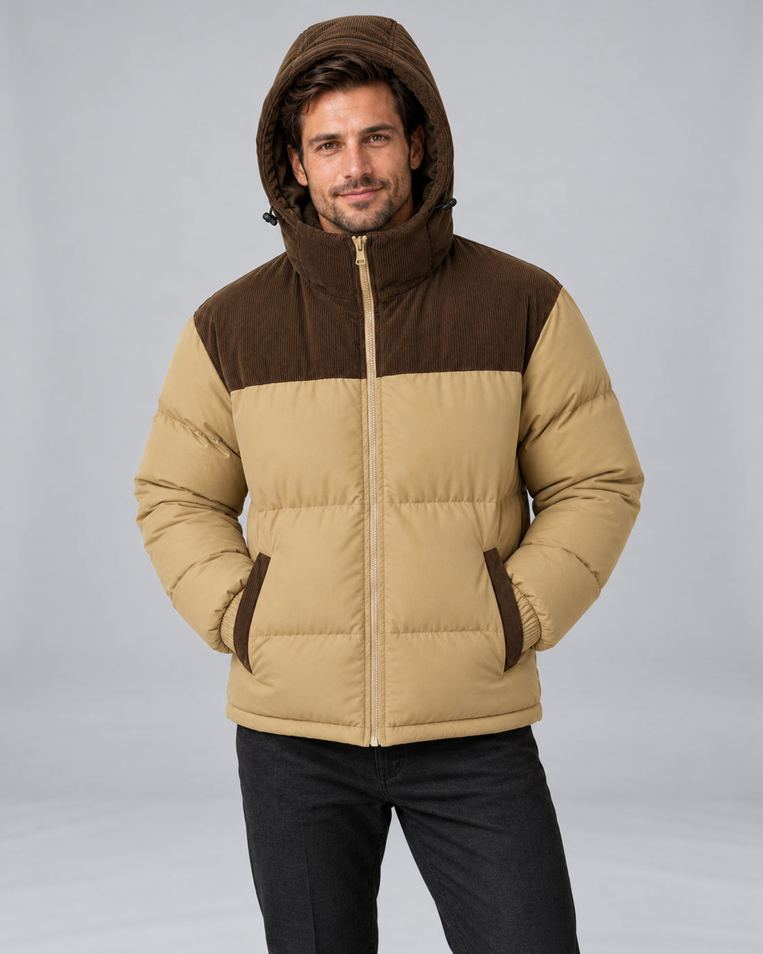 Men's hooded corduroy puffer jacket in khaki hood up, studio view