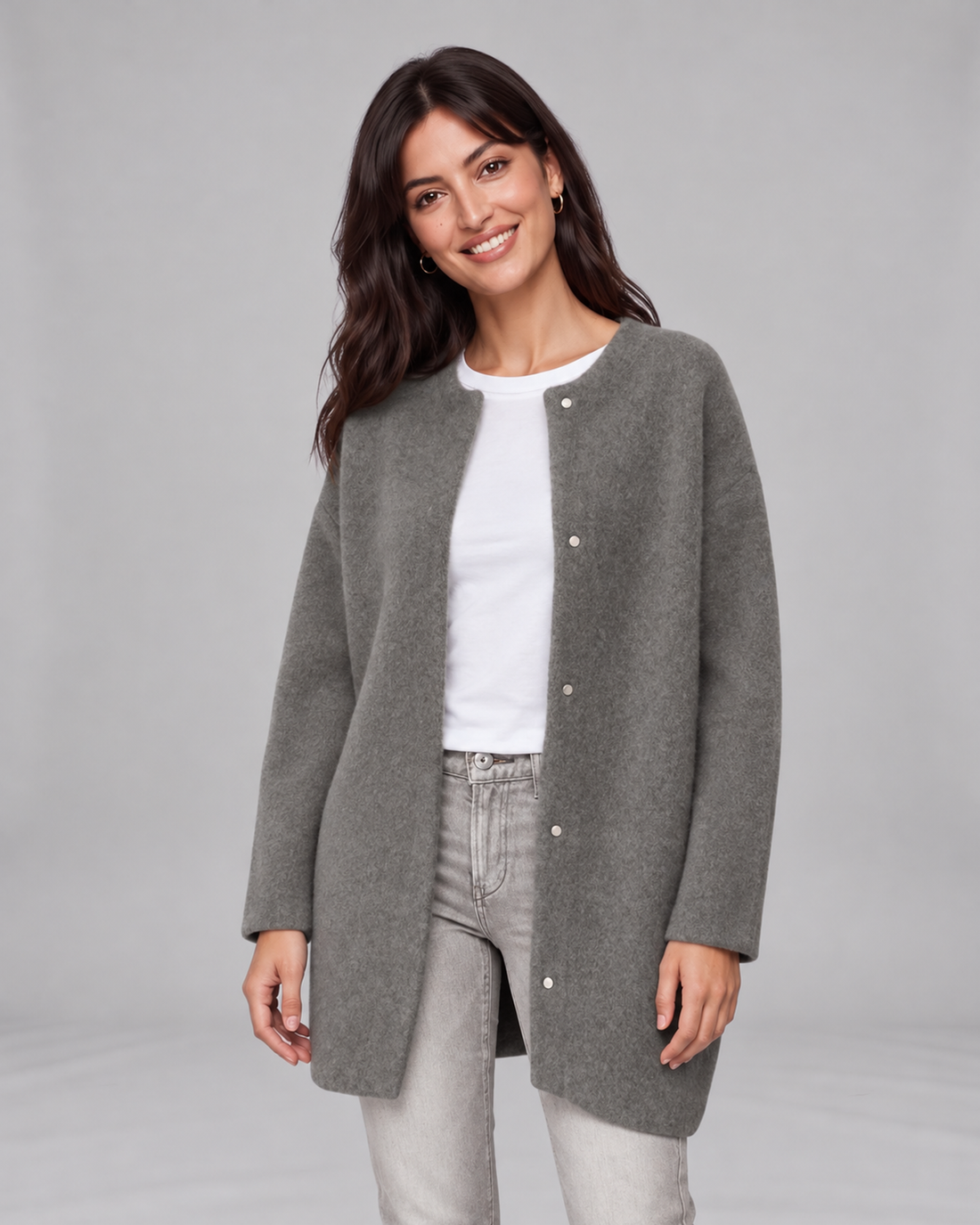 Grey women's longline cashmere cardigan, front view on Jasmine, grey studio