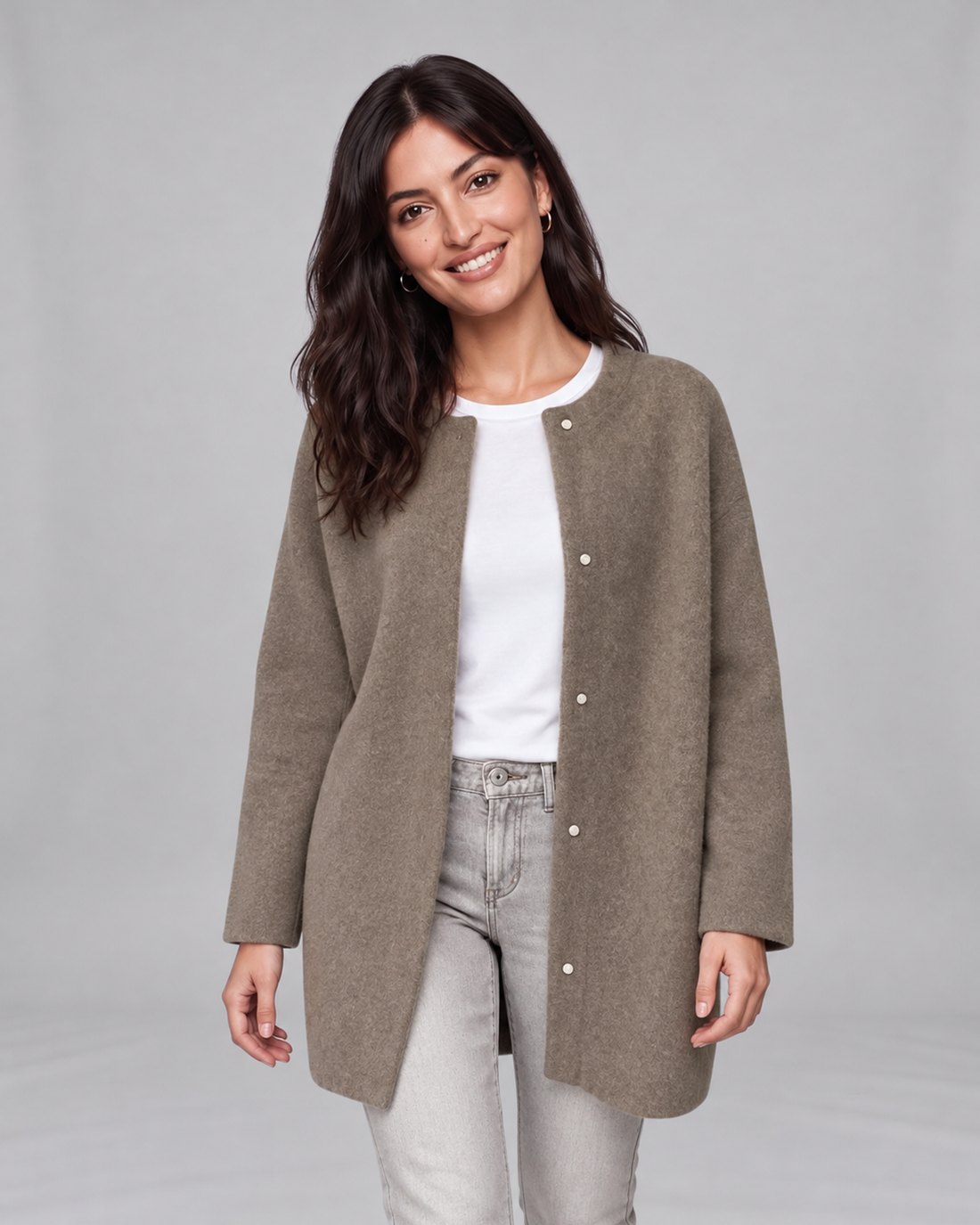Brown women's longline cashmere cardigan, front view on Jasmine, grey studio