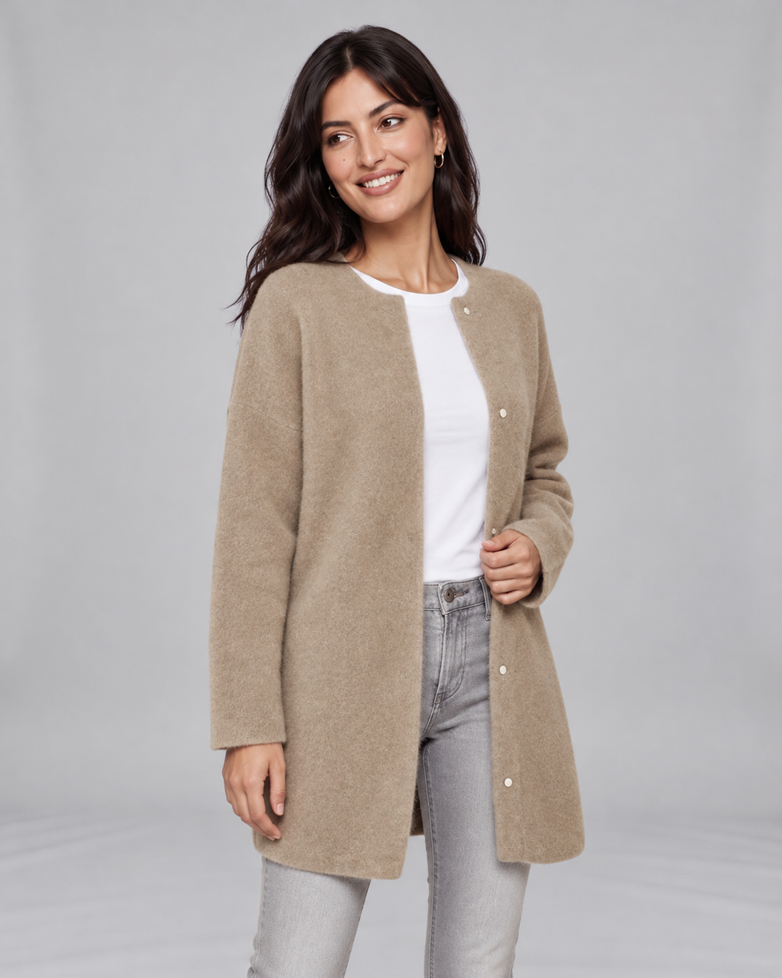 Khaki-brown women's longline cashmere cardigan, three-quarter view on Jasmine, grey studio