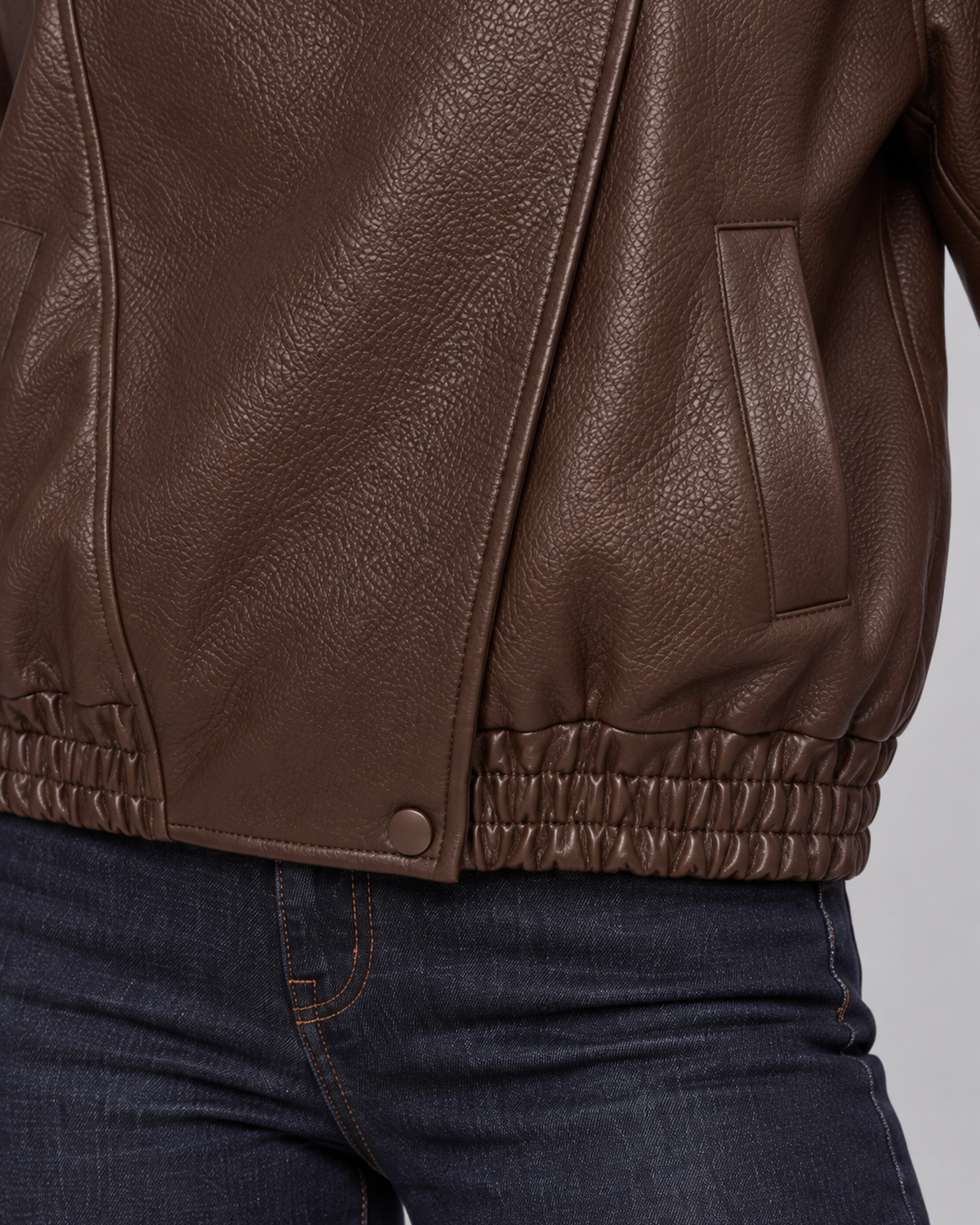 Chocolate pebble jacket texture, pocket and elasticated hem, dedicated Jasmine studio detail