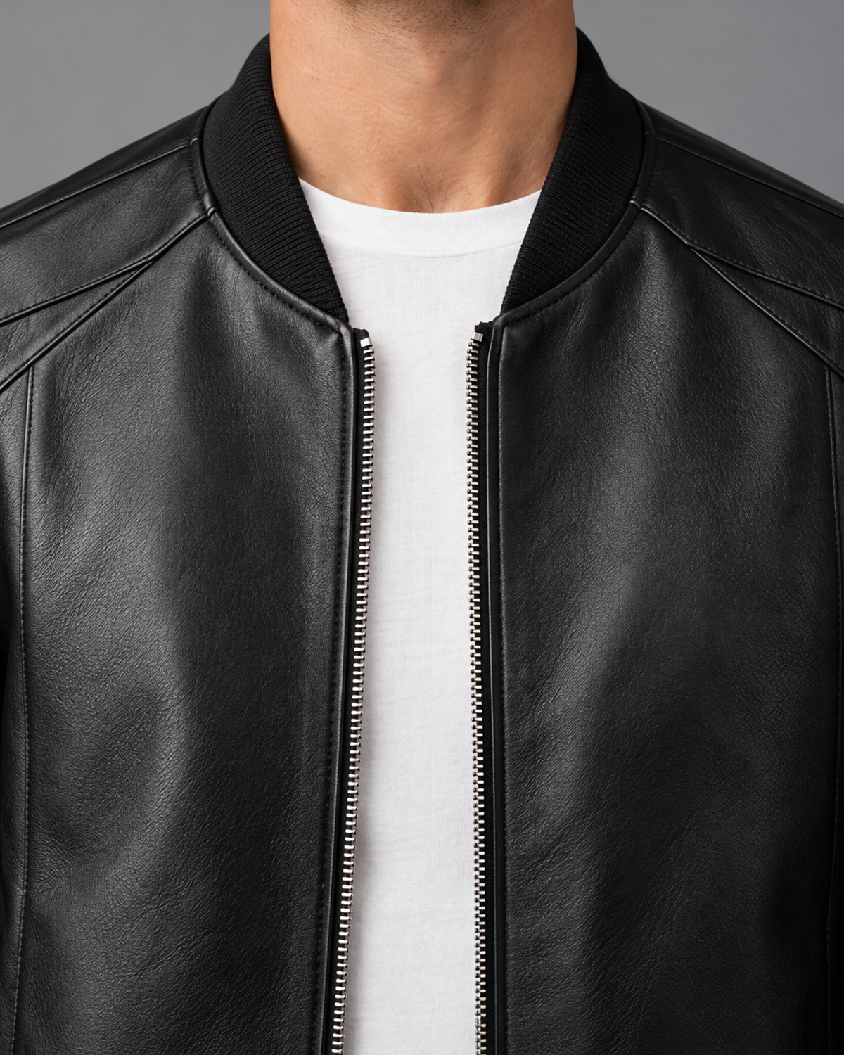 Men's Leather Bomber Jacket, Black, dedicated close-up of ribbed collar, upper zip and shoulder seams