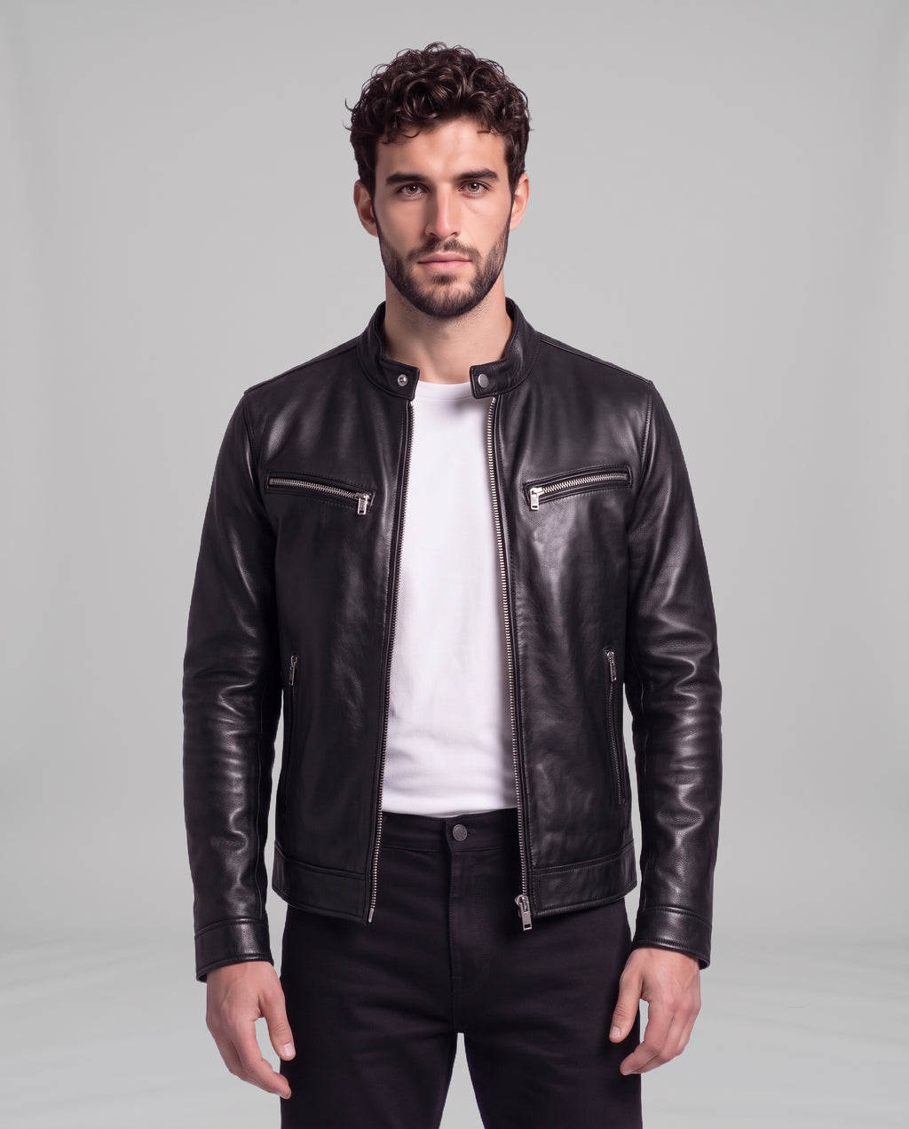 Male model wearing the Garrett vintage leather cafe-racer jacket in Biker Black over a white t-shirt, front view