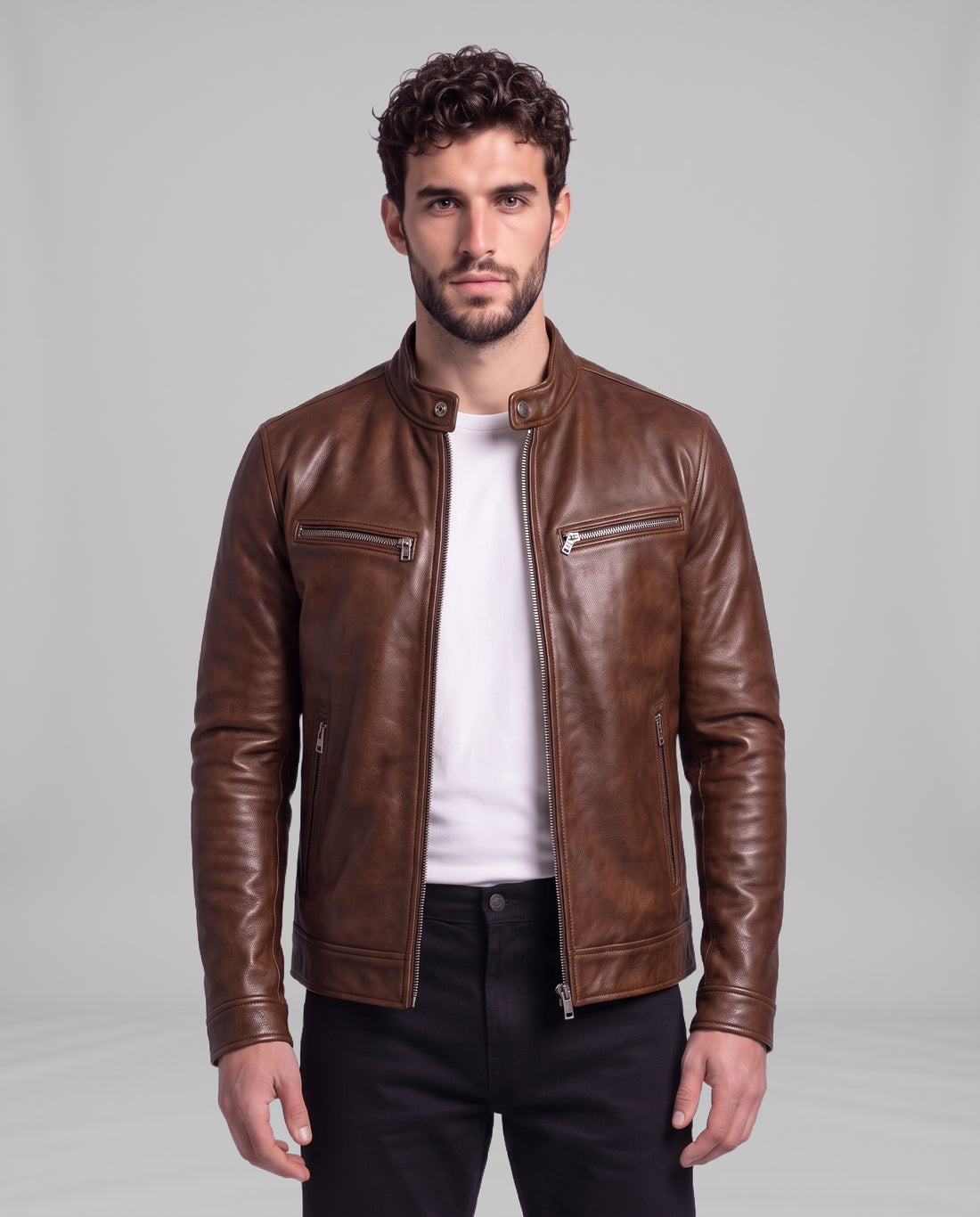 Male model wearing the Garrett vintage leather cafe-racer jacket in Cigar Brown over a white t-shirt, front view
