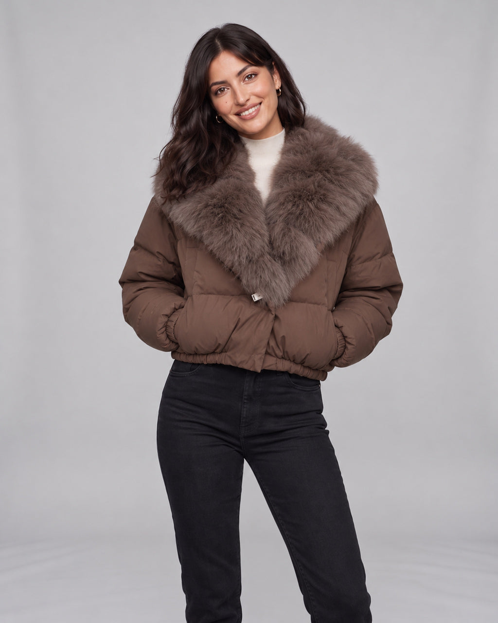 Women’s brown cropped puffer jacket with fox fur-lined hood — both pockets view on Jasmine