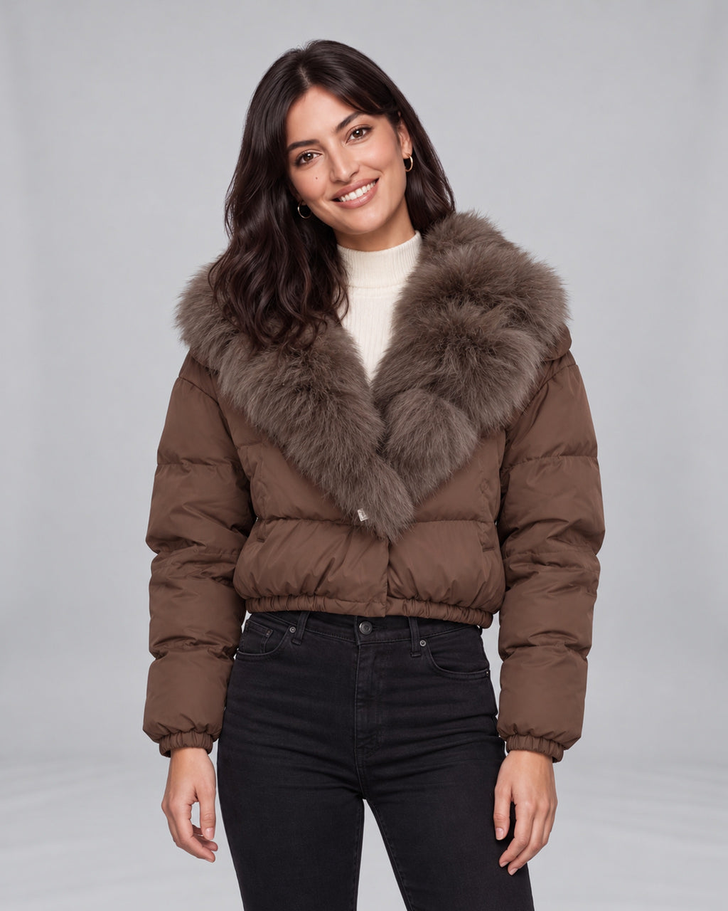 Women’s brown cropped puffer jacket with fox fur-lined hood — front view on Jasmine