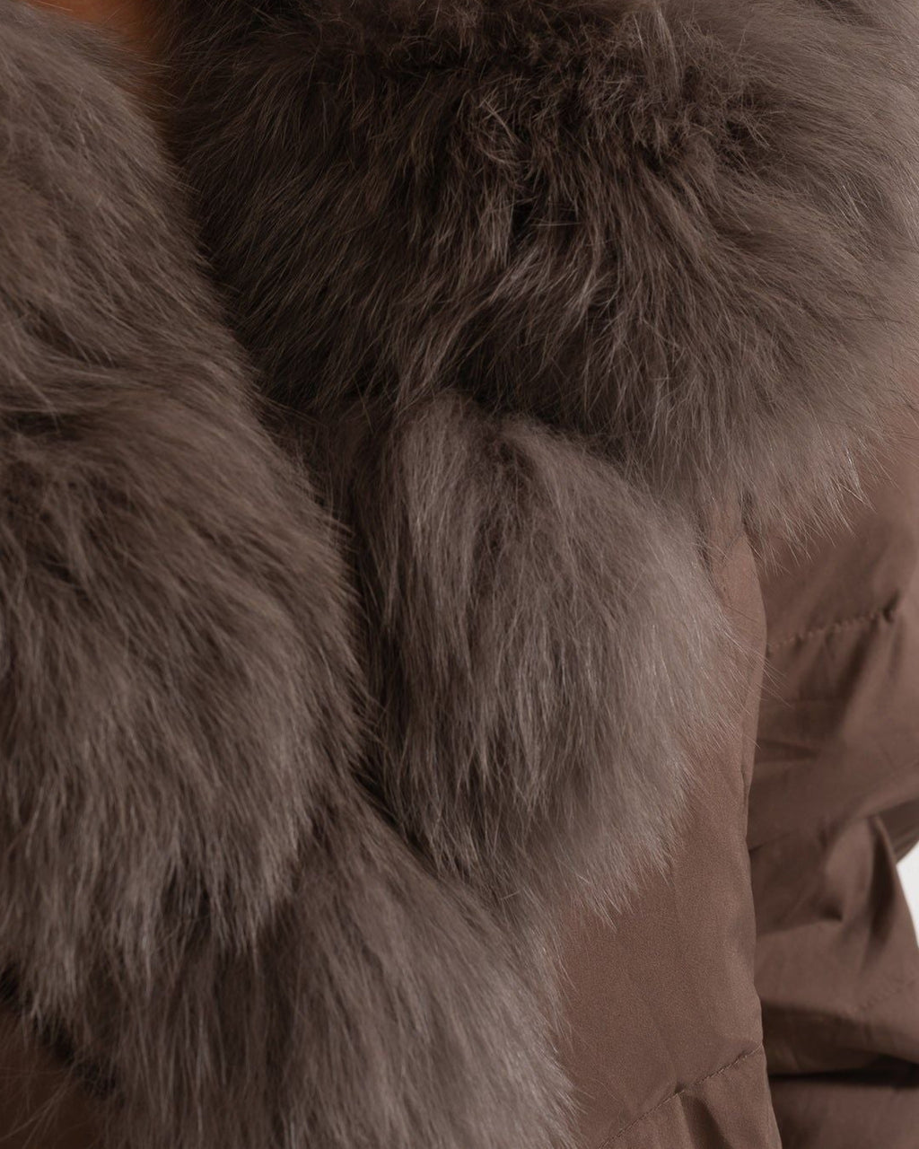 Brown fox fur-lined hood — close-up of the original puffer jacket fur and shell texture